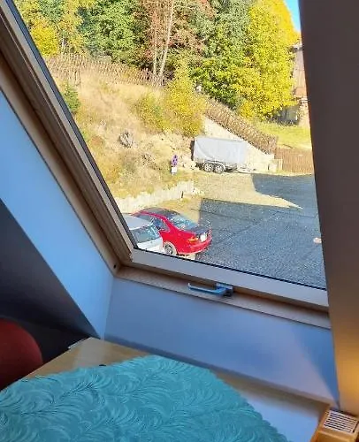 Goscinne Przy Kosciele Wang.