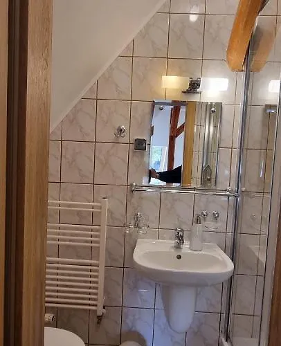 Goscinne Przy Kosciele Wang.